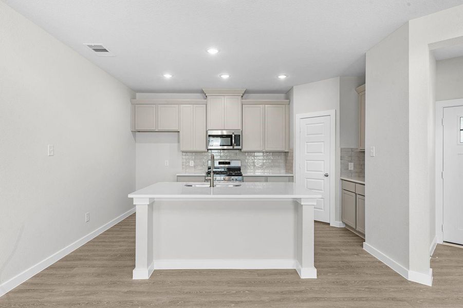 Furnished interior view inside a new home in Lexington Heights, Willis (Image 4).