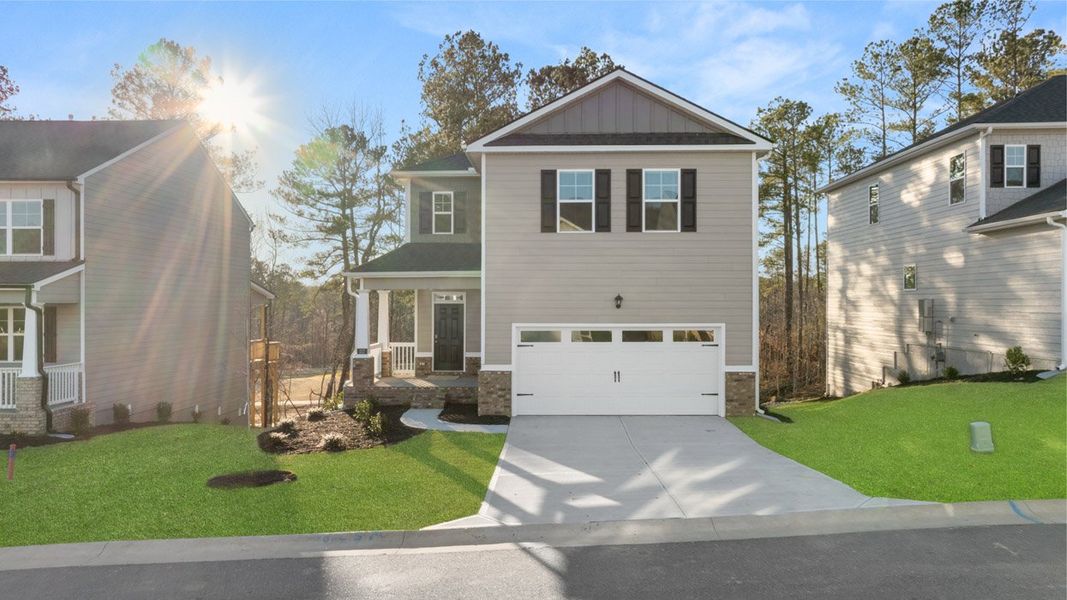 Front exterior of a new home in Southwind Village, Evans, GA, highlighting curb appeal (Image 21).