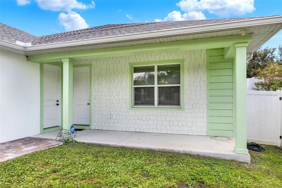 Front exterior of a new home in , Orlando, FL, highlighting curb appeal (Image 18).