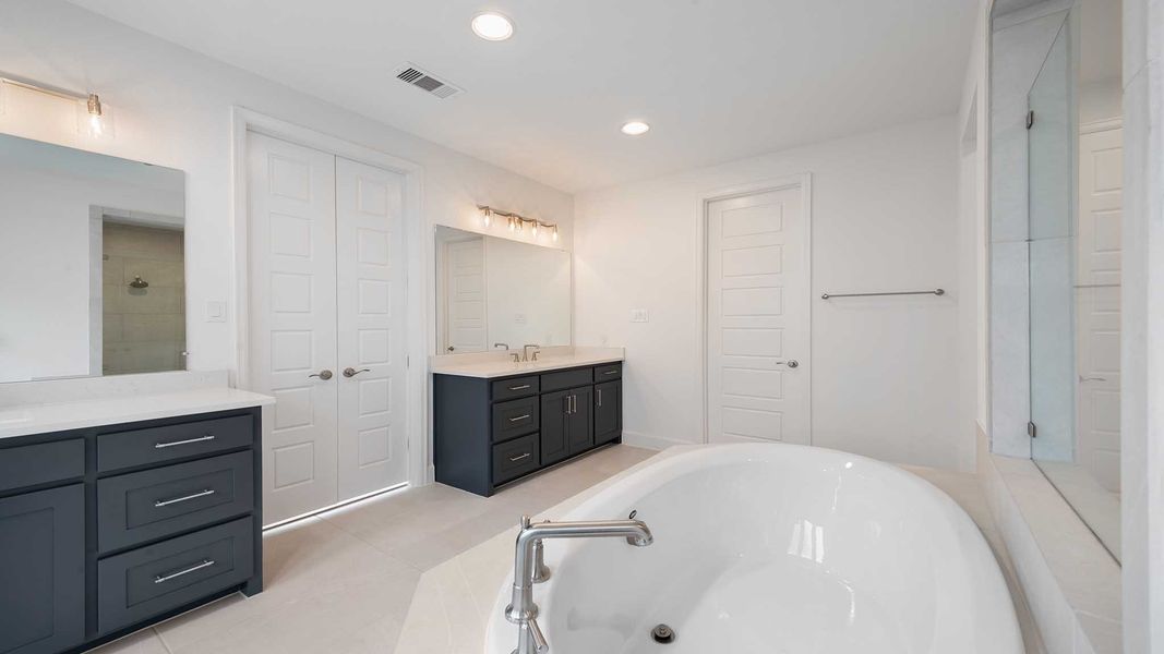 Representative furnished interior of a home built from the 3978W by Perry Homes in Austin Point, Richmond (Image 6).