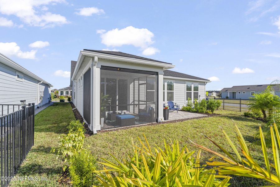 Exterior details and patio area of a home in Summer Bay at Grand Oaks, St. Augustine (Image 30).