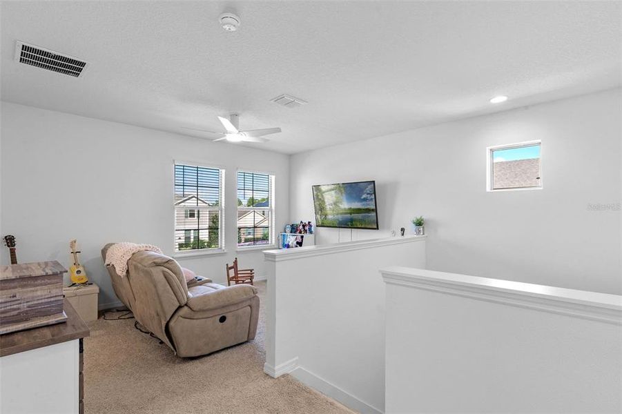 Furnished interior view inside a new home in Waterleigh, Winter Garden (Image 13).
