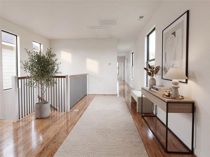 The spacious second-floor landing is filled with natural light and offers the perfect space for a reading nook, home office, or additional seating area while connecting the home's private living quarters.