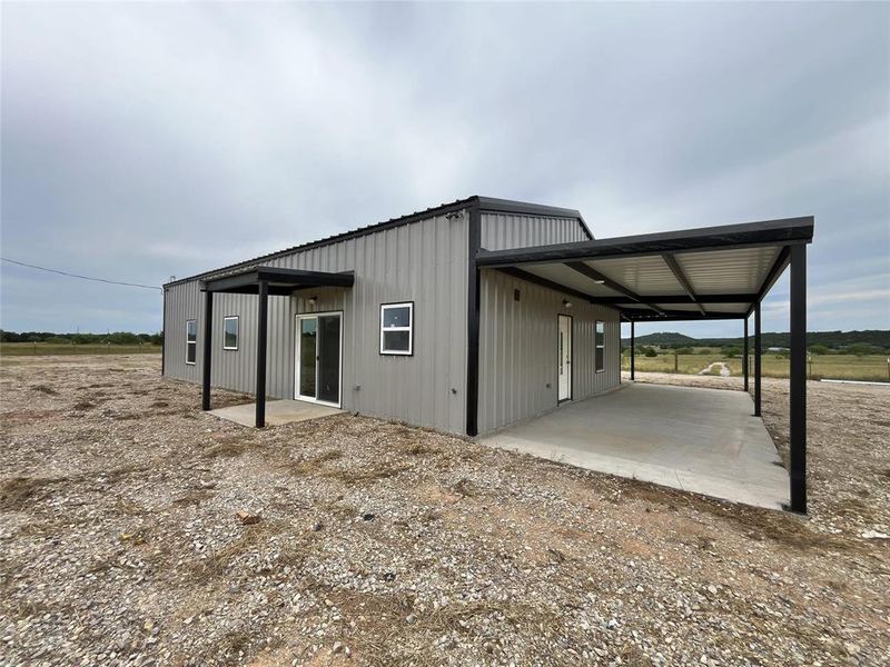 Exterior details and patio area of a home in , Mineral Wells (Image 18).