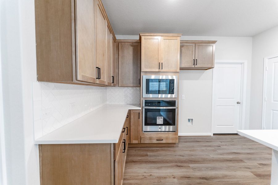 Furnished interior view inside a new home in The Woodlands at Medina Hills, Mico (Image 7).