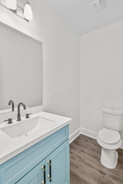 powder room located off of the garage! powder room located off of the garage!