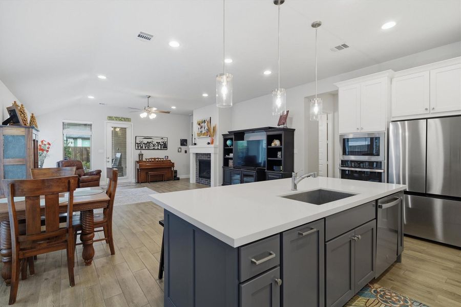 Open concept! Kitchen overlooks the living area. Large kitchen island boasts storage options on both sides Open concept! Kitchen overlooks the living area. Large kitchen island boasts storage options on both sides