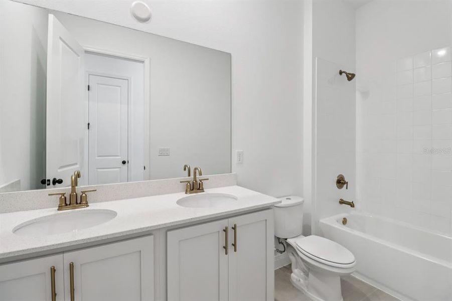 Furnished interior view inside a new home in Ardisia Park Estate, New Smyrna Beach (Image 4).