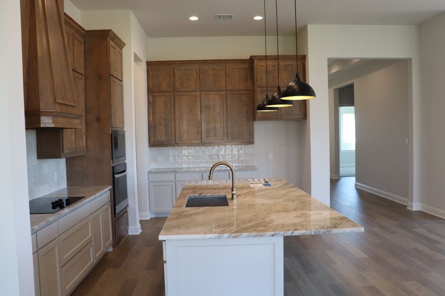 Furnished interior view inside a new home in Bull Hide Estates, Hewitt (Image 6).