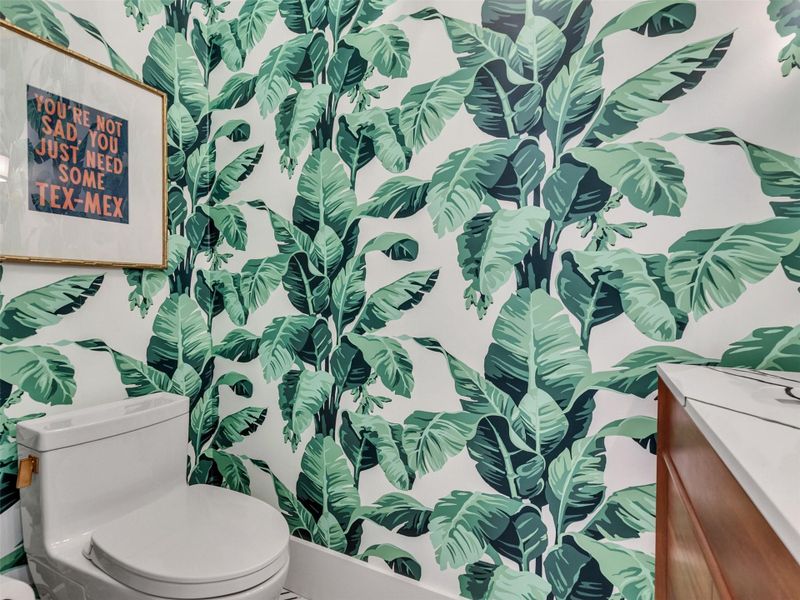 This powder room is more than a statement — it’s an experience. The custom wallpaper brings the vibrancy of the coast indoors, paired perfectly with sleek fixtures and a gorgeous sink. Whether you’re hosting guests or enjoying a quiet evening in, every corner of this home reflects a refined yet lively coastal spirit. It’s the kind of detail that reminds you: living here isn’t just comfortable — it’s special, memorable, and full of charm. This powder room is more than a statement — it’s an experience. The custom wallpaper brings the vibrancy of the coast indoors, paired perfectly with sleek fixtures and a gorgeous sink. Whether you’re hosting guests or enjoying a quiet evening in, every corner of this home reflects a refined yet lively coastal spirit. It’s the kind of detail that reminds you: living here isn’t just comfortable — it’s special, memorable, and full of charm.