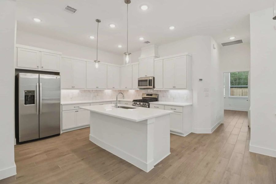 Furnished interior view inside a new home in Kresston Chateau, Montgomery (Image 4).