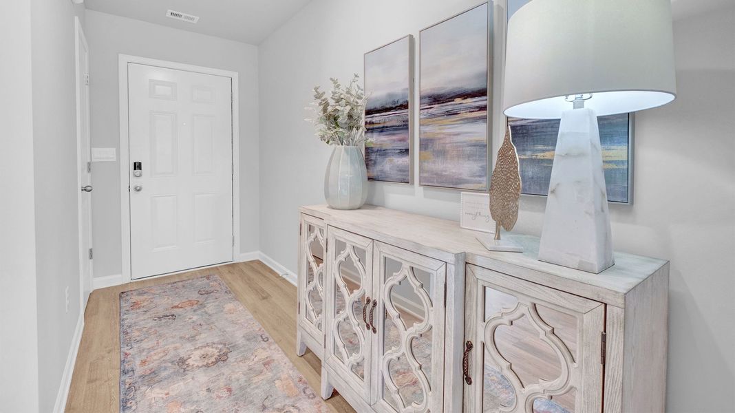 Representative furnished interior of a home built from the Cali by D.R. Horton in Riggs Pointe, Millington (Image 4).