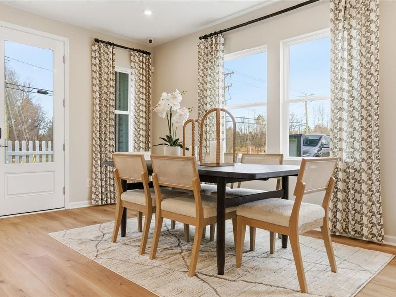 Representative furnished interior of a home built from the Cardinal by Tri Pointe Homes in Ellis Townes, Charlotte (Image 10).