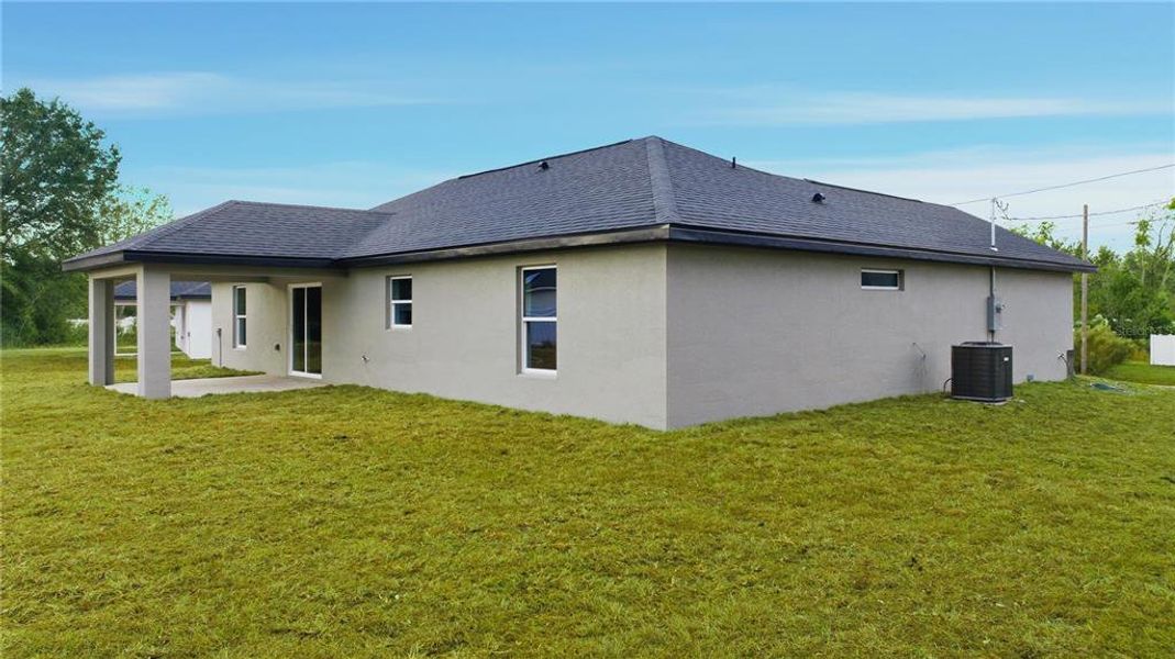 Exterior details and patio area of a home in , Ocala (Image 2).