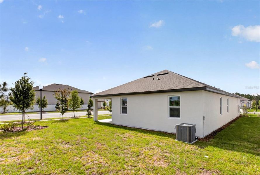 Exterior details and patio area of a home in Sunbrooke, St. Cloud (Image 20).