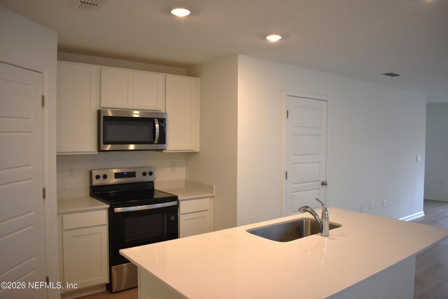Furnished interior view inside a new home in Irongate Villas, Jacksonville (Image 5).