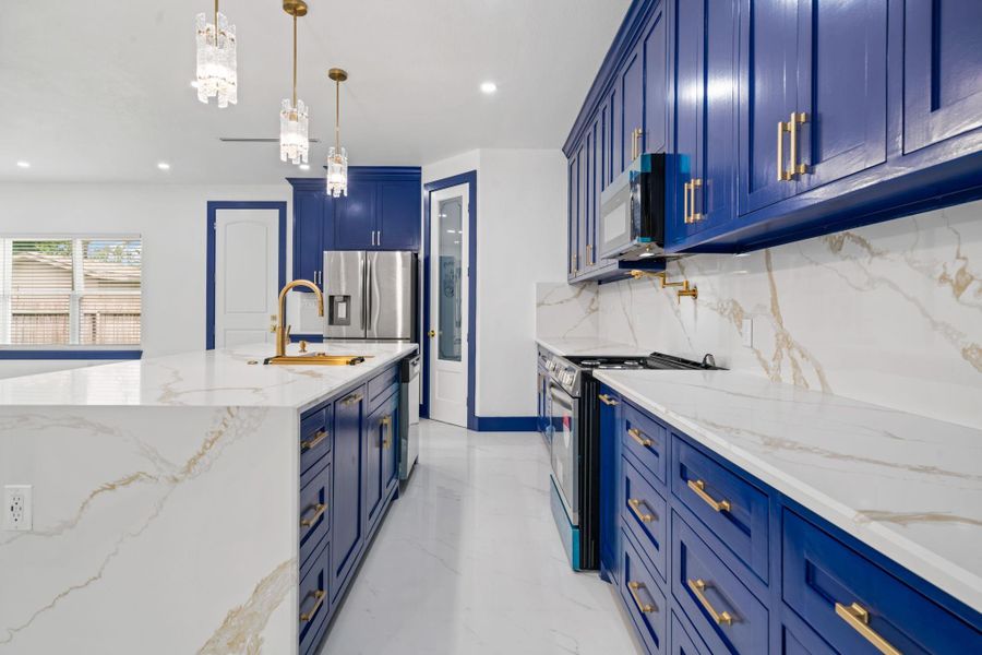 Another view of the kitchen. All cabinets have the soft-close feature. Another view of the kitchen. All cabinets have the soft-close feature.