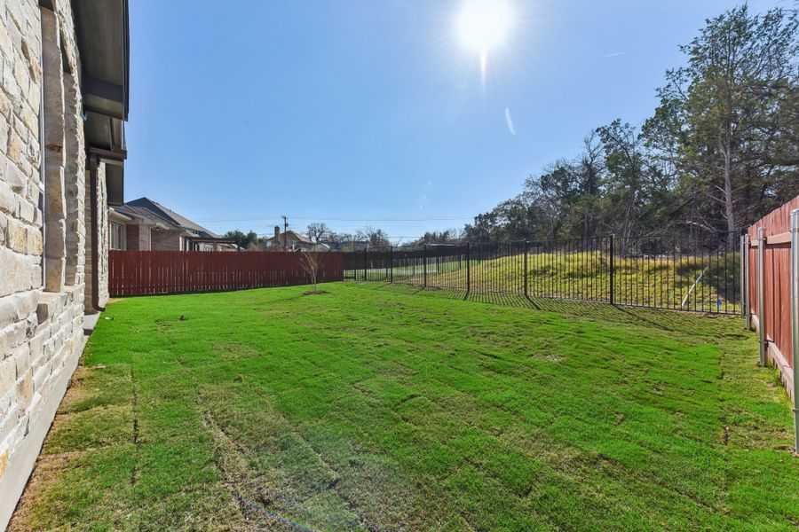Exterior details and patio area of a home in Sauls Ranch, Round Rock (Image 19).