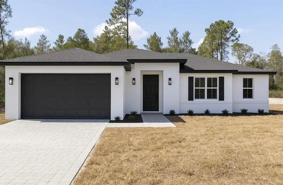 Front exterior of a new home in , North Port, FL, highlighting curb appeal (Image 1). Front exterior of a new home in , North Port, FL, highlighting curb appeal (Image 1).