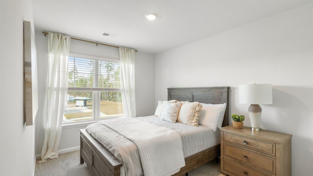 Furnished interior view inside a new home in The Towns at Blue Jay, Rincon (Image 21).
