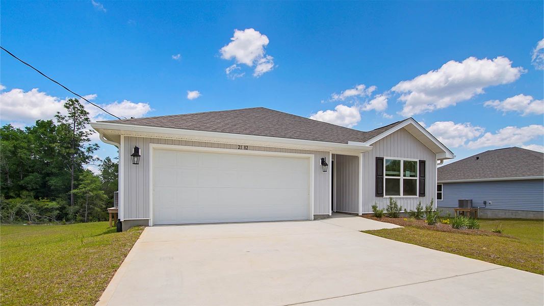 Representative exterior photo of a completed home built from the Aldridge by D.R. Horton in Sunny Hills, Chipley, FL (Image 26).