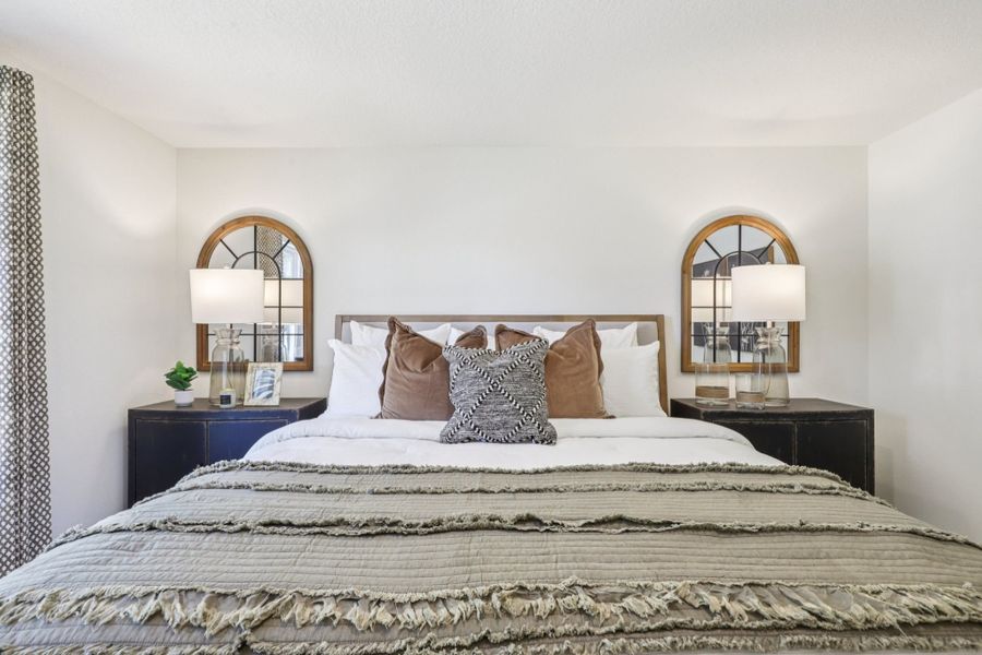 A bed with pillows. A bed with pillows.