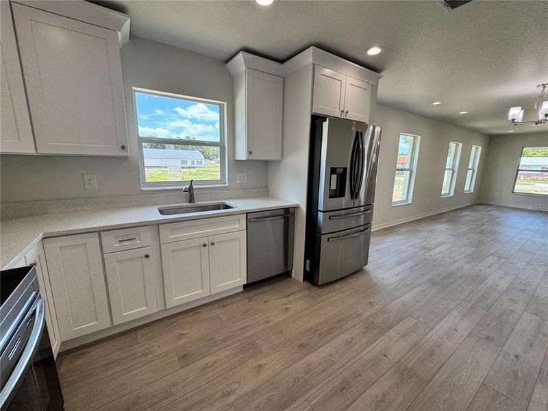 Furnished interior view inside a new home in , Zephyrhills (Image 12). Furnished interior view inside a new home in , Zephyrhills (Image 12).