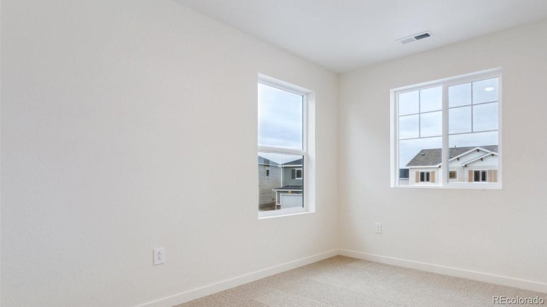 Spacious, unfurnished interior of a new home in Silver Peaks, Lochbuie (Image 13).