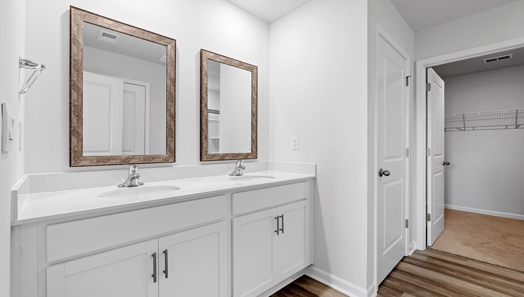 Furnished interior view inside a new home in Bentley Park, Greenwood (Image 15).