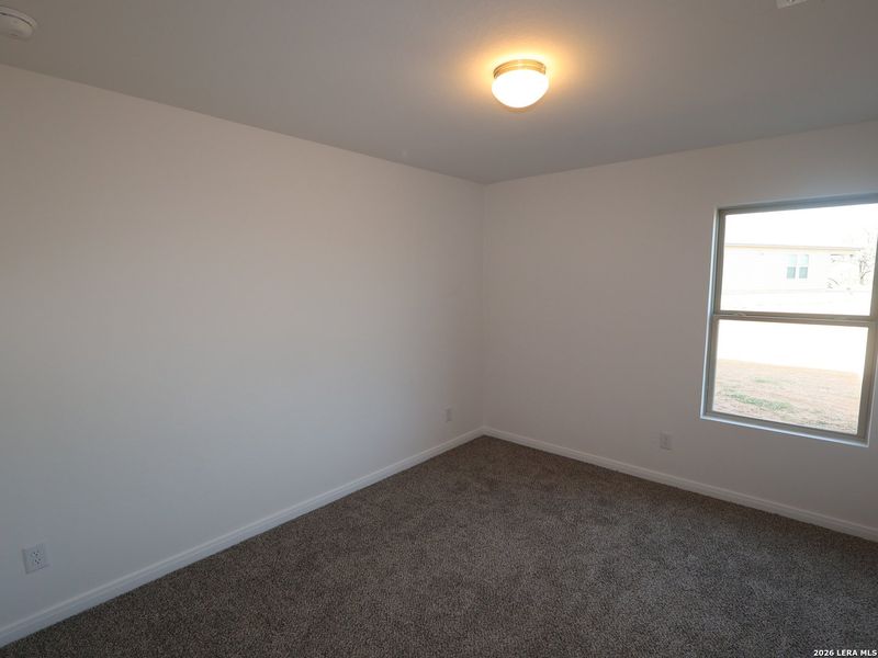 Spacious, unfurnished interior of a new home in Chaparral Ranch, Floresville (Image 16).