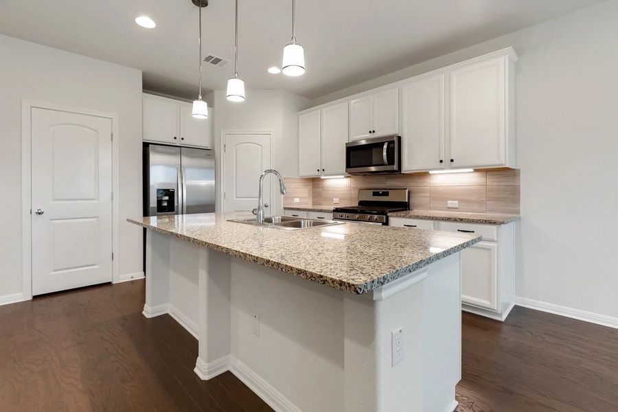 Representative furnished interior of a home built from the Cambridge by Ashton Woods in Lagos Reserve, Manor (Image 9). Representative furnished interior of a home built from the Cambridge by Ashton Woods in Lagos Reserve, Manor (Image 9).