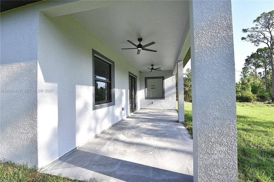 Exterior details and patio area of a home in , Lehigh Acres (Image 4).