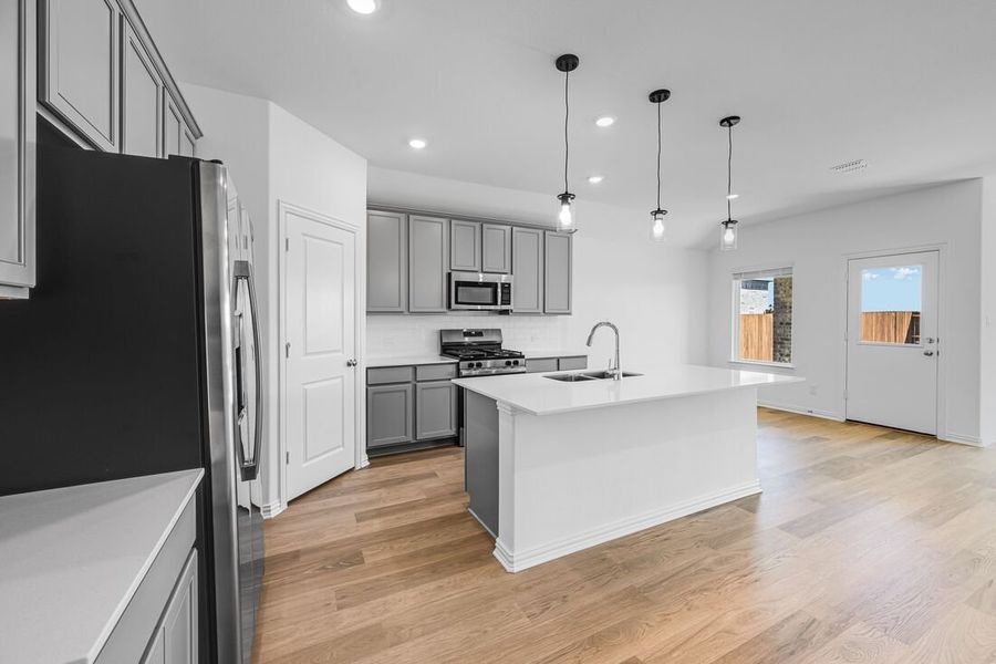 Furnished interior view inside a new home in Parks at Foster Crossing, Anna (Image 9).