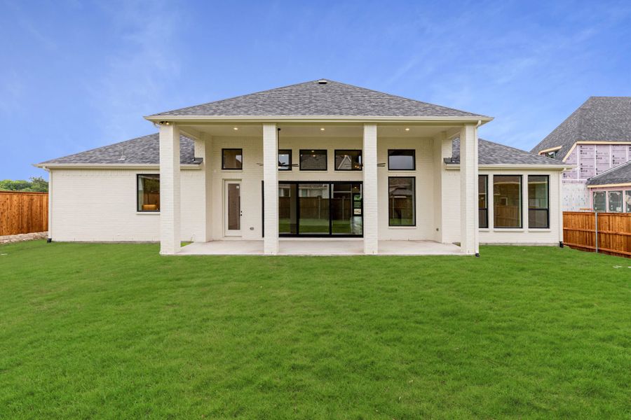 Representative exterior details of a home built from the 7042 by Tradition Homes in Mustang Lakes, McKinney (Image 21).