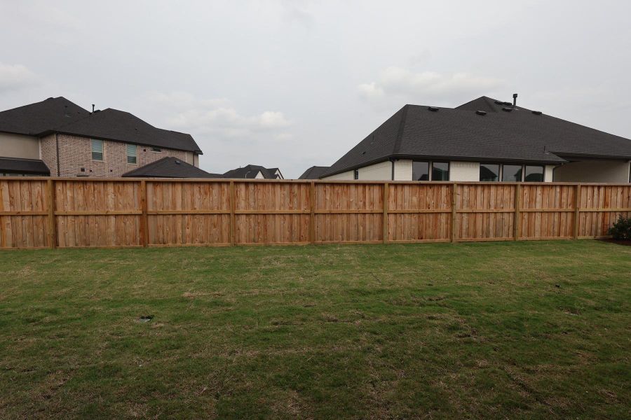 Exterior details and patio area of a home in Dunham Pointe, Cypress (Image 20). Exterior details and patio area of a home in Dunham Pointe, Cypress (Image 20).