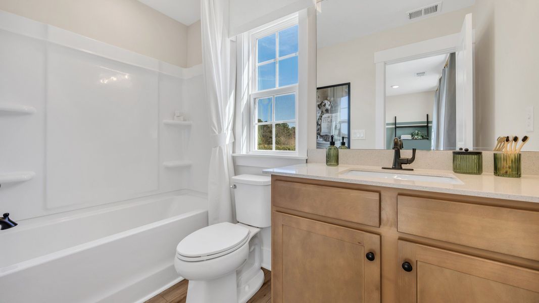 Representative furnished interior of a home built from the Lighthouse by DRB Homes in Chestnut Farms, Longs (Image 30).