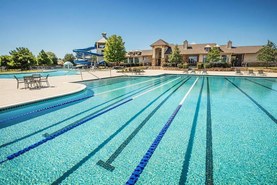 ShadowGlen offers two big pools, a children’s splash pad area, and twisting, towering water slides