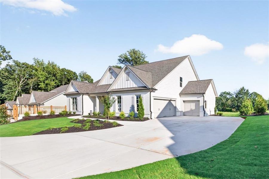 Front exterior of a new home in , Gainesville, GA, highlighting curb appeal (Image 27).