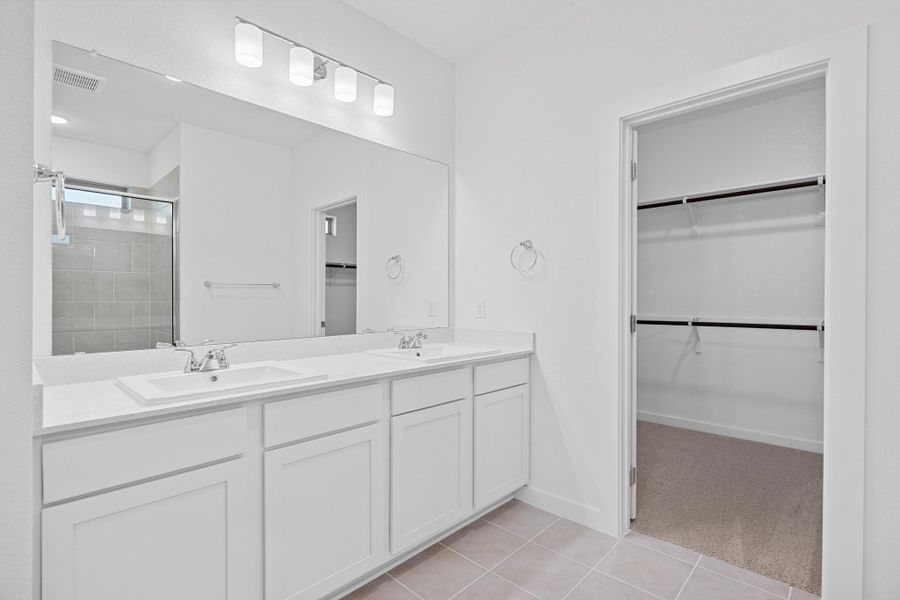 Primary Bath in the Oak home plan by Trophy Signature Homes – REPRESENTATIVE PHOTO Primary Bath in the Oak home plan by Trophy Signature Homes – REPRESENTATIVE PHOTO