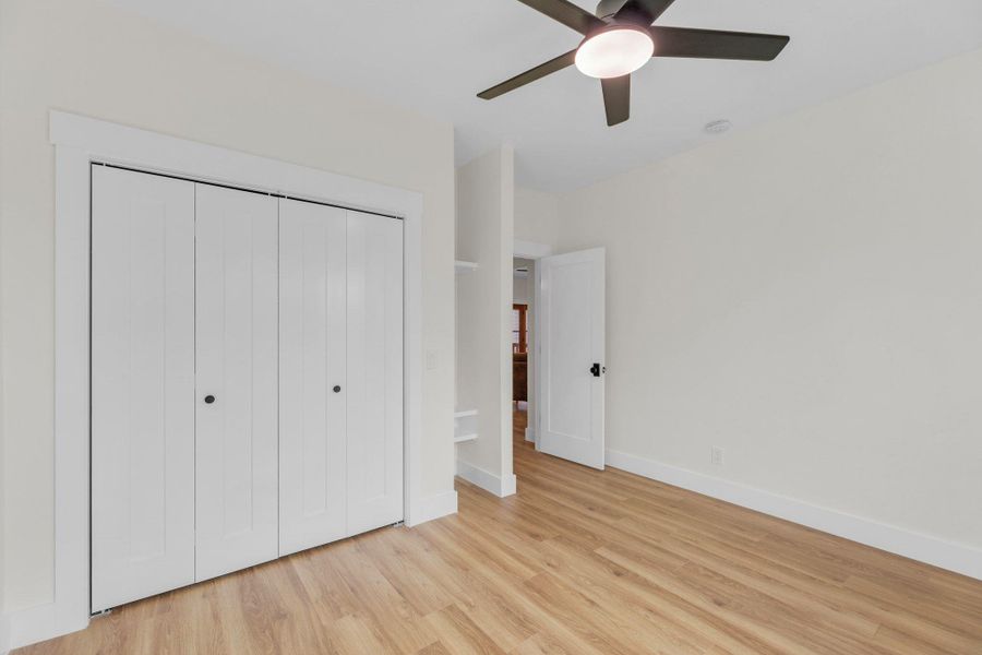 One of 2 bedrooms in ADU. Ceiling fan and closet.