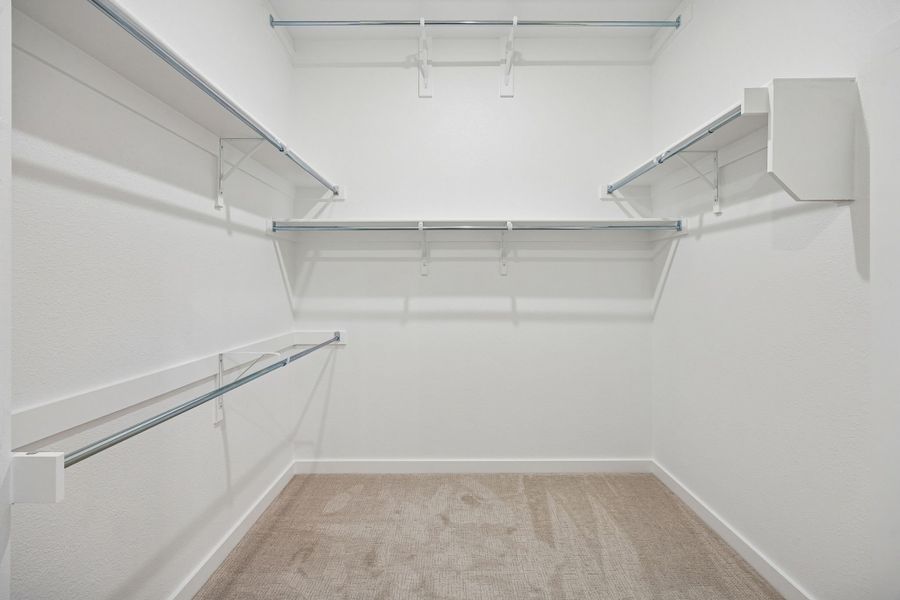 Primary Closet in the Gilmour II home plan by Trophy Signature Homes – REPRESENTATIVE PHOTO