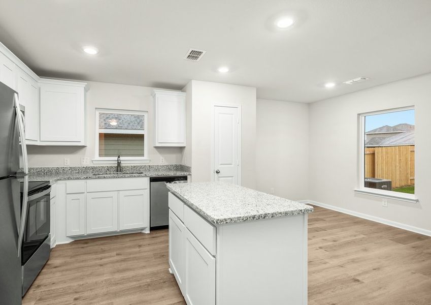 The kitchen has sprawling granite countertops. The kitchen has sprawling granite countertops.