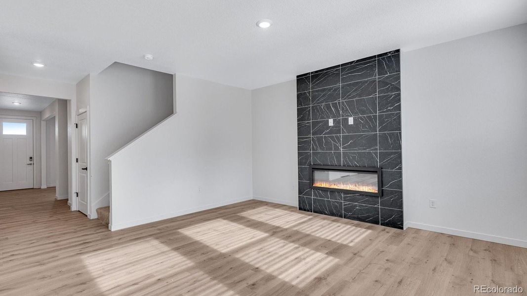 Spacious, unfurnished interior of a new home in Trails at Crowfoot, Parker (Image 32).