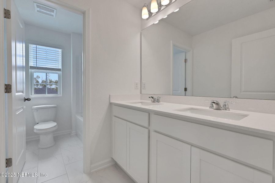 Furnished interior view inside a new home in Cordova Palms, St. Augustine (Image 9).