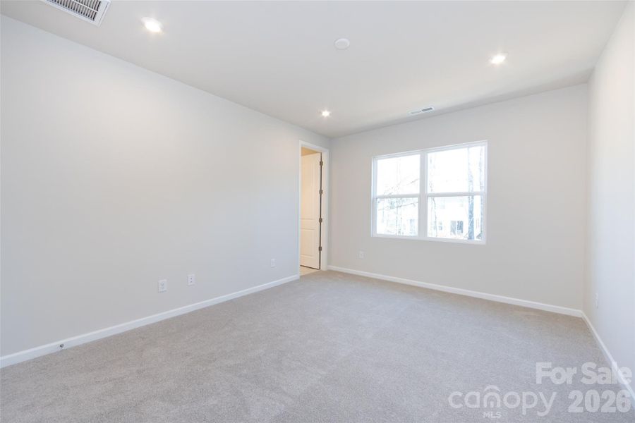 Primary Bedroom with High Ceilings