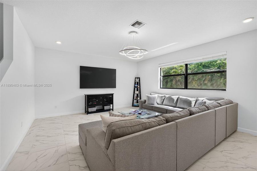 Furnished interior view inside a new home in , Royal Palm Beach (Image 8).