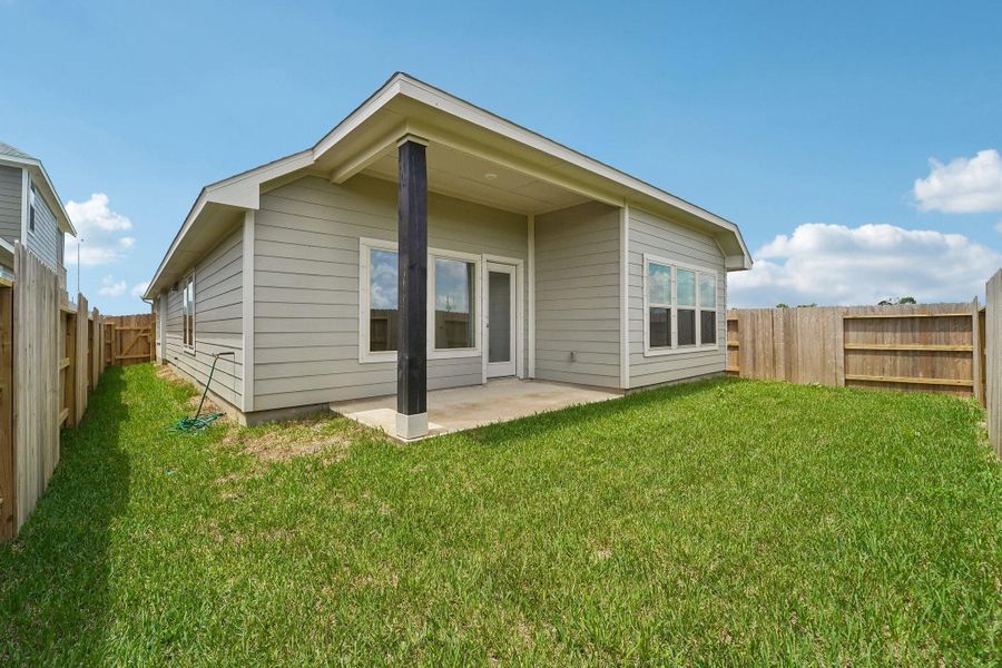 Exterior details and patio area of a home in Aldeana - Tejas Collection, Bonney (Image 3).