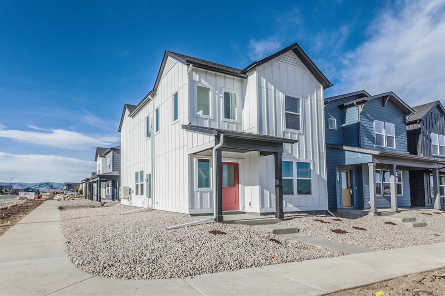Representative exterior photo of a completed home built from the Sage by Hartford Homes in Prairie Song Cottages, Windsor, CO (Image 2). Representative exterior photo of a completed home built from the Sage by Hartford Homes in Prairie Song Cottages, Windsor, CO (Image 2).