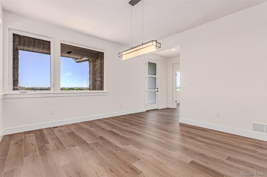 Spacious, unfurnished interior of a new home in West Grange, Longmont (Image 25).