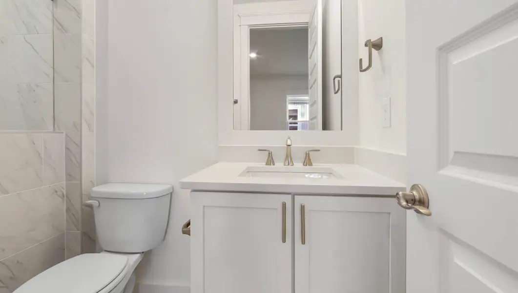 Representative furnished interior of a home built from the Ava by D.R. Horton in Parkside, Santa Rosa Beach (Image 10).